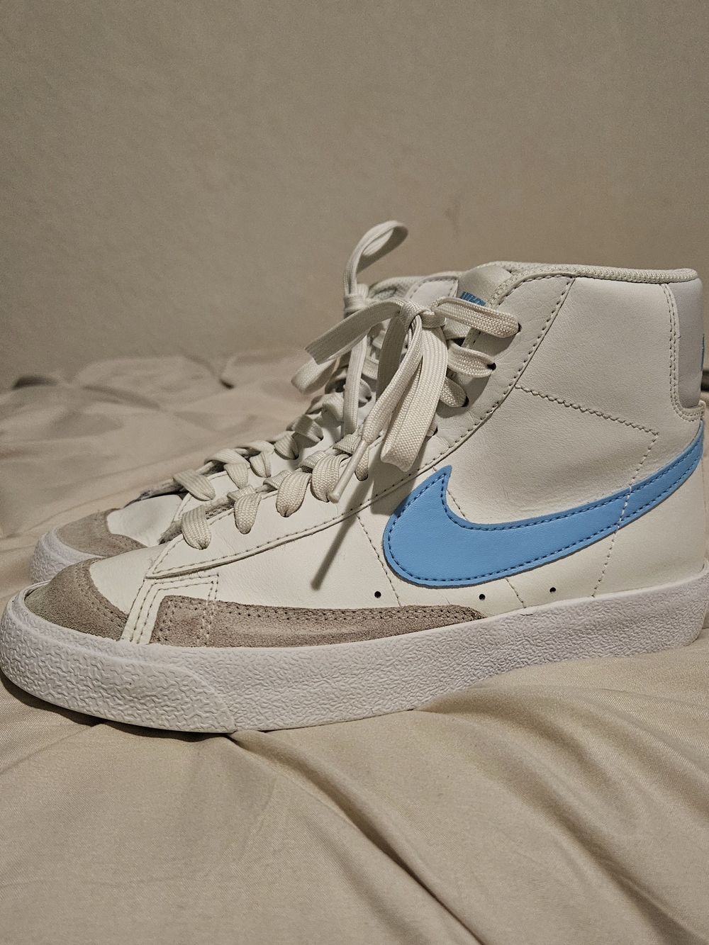 Nike Big Kids 4.5 Blazer '77 Mid-Top Leather Sneakers in White with Blue Swoosh